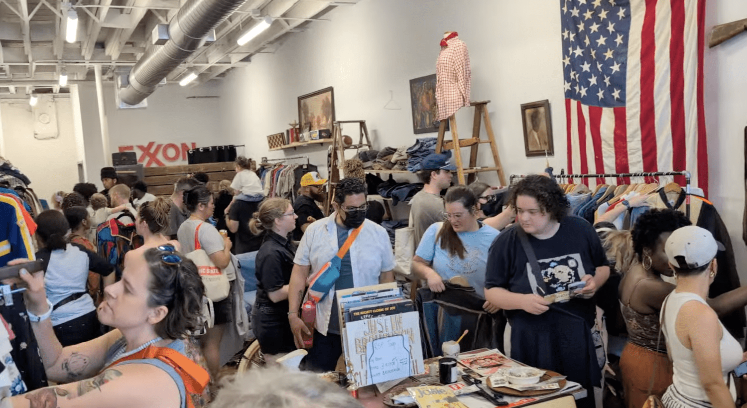 Durham locals browsing together during a Discovery Drop at Middle of May Vintage Thrift